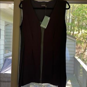 Tunic with washable leather insert